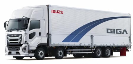 An Isuzu heavy-duty Giga truck shown in profile pic against a white background